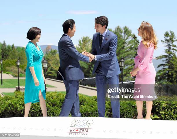 Japanese Prime Minister Shinzo Abe and his wife Akie are welcomed by Canadian Prime Minister Justin Trudeau and his wife Sophie Gregoire during the...