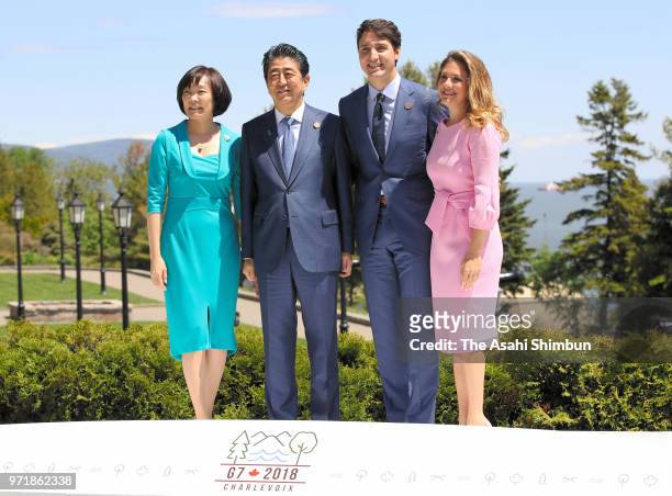 Japanese Prime Minister Shinzo Abe and his wife Akie are welcomed by Canadian Prime Minister Justin Trudeau and his wife Sophie Gregoire during the...