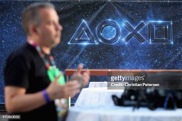 Game enthusiasts and industry personnel attend the Sony Playstation E3 conference at LA Center Studios on June 11, 2018 in Los Angeles, California....