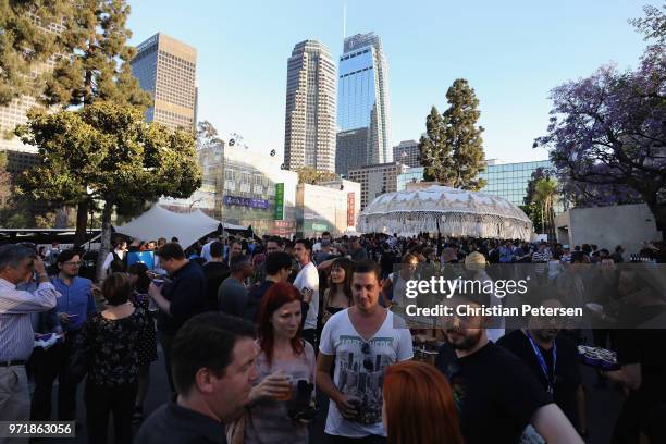 Game enthusiasts and industry personnel attend the Sony Playstation E3 conference at LA Center Studios on June 11, 2018 in Los Angeles, California....