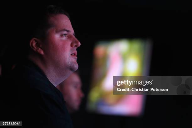 Game enthusiasts and industry personnel attend the Sony Playstation E3 conference at LA Center Studios on June 11, 2018 in Los Angeles, California....