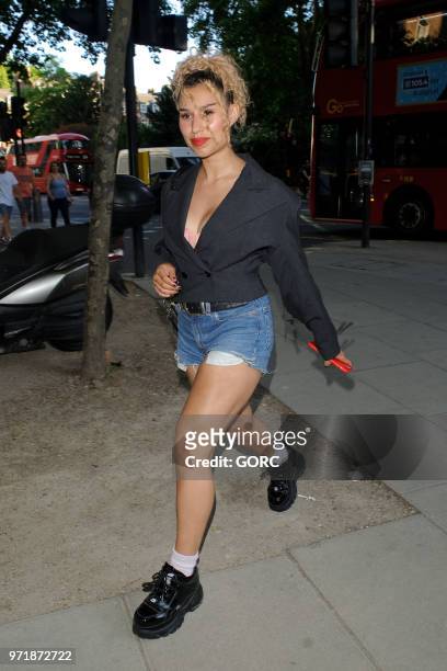 Raye seen arriving at GQ dinner in Holborn on June 11, 2018 in London, England.