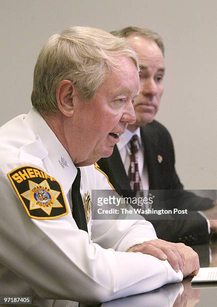 Sm-police25 01-25-04 Mark Gail_TWP Charles Co. Sheriff Fred Davis at the signing of a memorandum of understanding with the Maryland State Police...