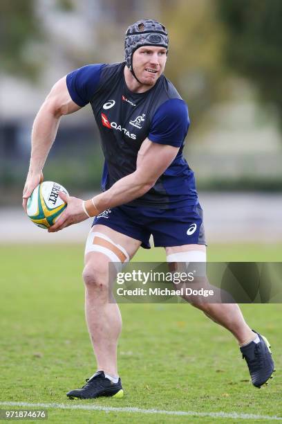 David Pocock of the Wallabies passes the ball during an Australian Wallabies training saession on June 12, 2018 in Melbourne, Australia.