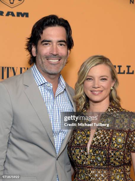 Carter Oosterhouse and Amy Smart attend the 'Yellowstone' premiere at Paramount Studios on June 11, 2018 in Hollywood, California.