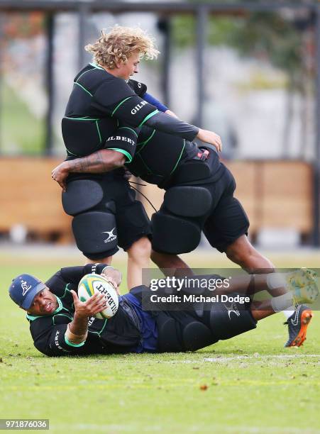 Kurtley Beale competes for the ball during an Australian Wallabies training saession on June 12, 2018 in Melbourne, Australia.