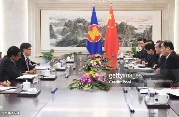 Association of South East Asian Nations Secretary-General Lim Jock Hoi speaks during a meeting with Chinese Foreign Minister Wang Yi at the Foreign...