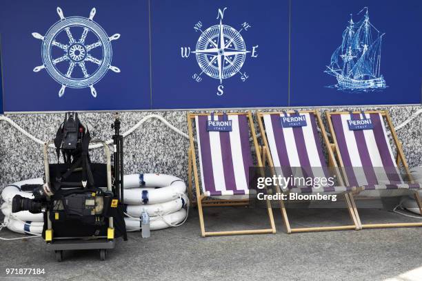 Television camera sits on a cart next to beach chairs outside a restaurant in Singapore, on Monday, June 11, 2018. President Donald Trump is about to...