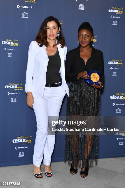 Actress Aure Atika and Khadidiatou Sow attend the 'Les Nuits En Or 2018' dinner gala at UNESCO on June 11, 2018 in Paris, France.