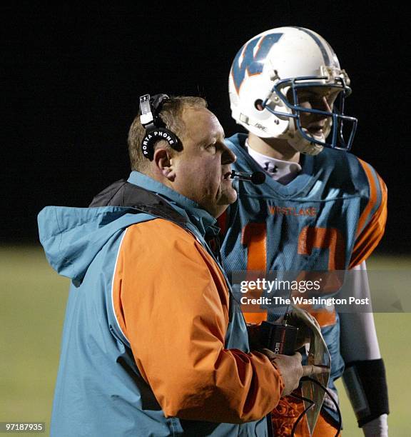 Kevin Clark/The Washington Post Date: Neg #: 149285 Westlake High School, Waldorf, MD Westlake head coach Dominic Zaccarelli talks with QB Buck Smith...