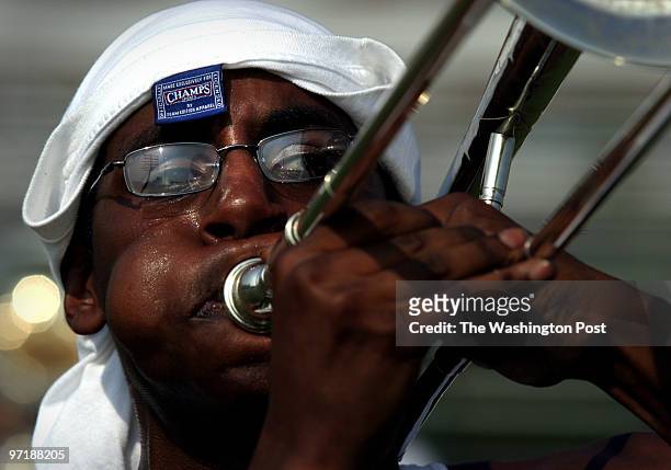 Trombonist Brian Doyle, a Howard U. Sophmore, practices playing and marching at Howard University stadium as the 160 member "Showtime Marching Band"...