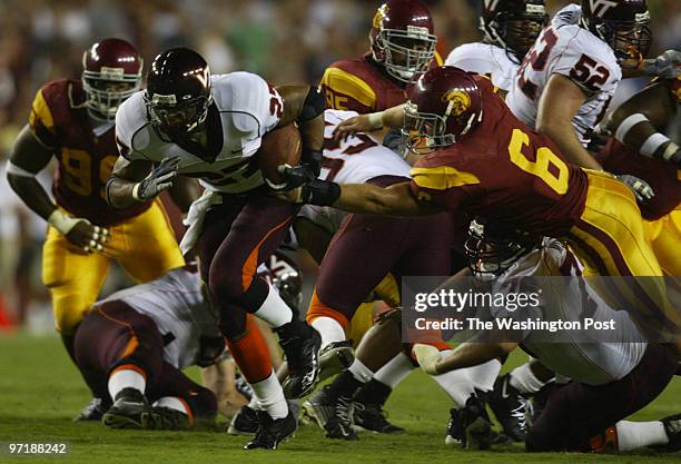 Neg#:158952 Photog:Preston Keres/TWP FedEx Field, Lancover, Md. Virginia Tech's Justin Hamilton breaks away from Matt Grootegoed and the USC defense...