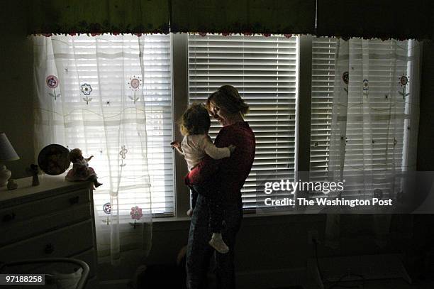 Me/virginia_date: Feb 28, 2004_photog: Gerald Martineau_ Springfield, VA_neg: 152759_ Prents with cerebralpalsy child_ Carrin Brandt relates to her 3...