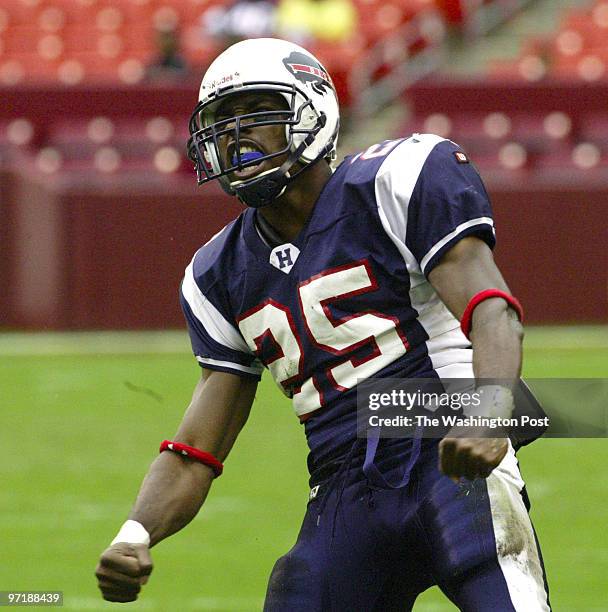 Sp-bison18 9/18/04 Landover, Md. #159742 Mark Gail_TWP Howard's Antoine Rutherford celebrates a good run against the Alcorn State defense in the...