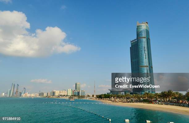 Modern buildings and skyscrapers, palm trees and beaches at Saadiyat Island on November 27, 2015 in Abu Dhabi, Emirate Abu Dhabi.