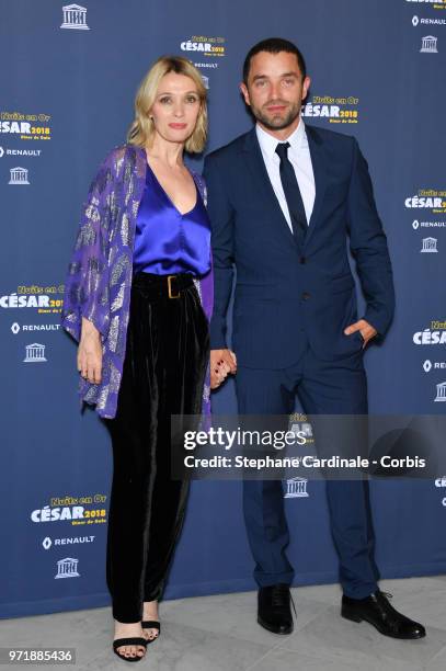 Actors Anne Marivin and Guillaume Gouix attends the 'Les Nuits En Or 2018' dinner gala at UNESCO on June 11, 2018 in Paris, France.