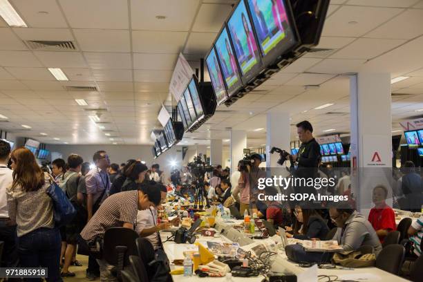 Journalists report from the International Media Center as the unprecedented meeting between US President Donald Trump and DPRK Chairman Kim Jong Un...