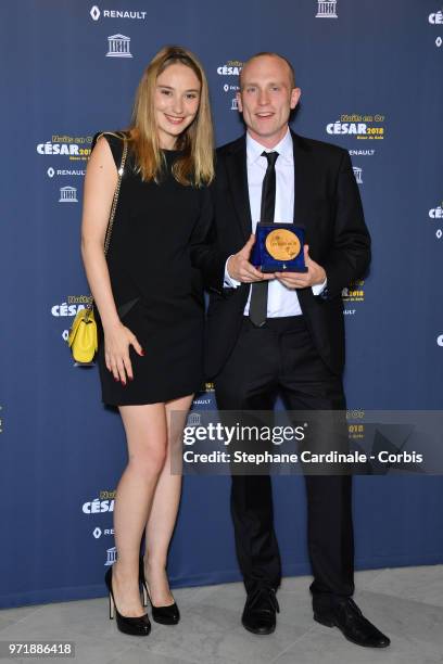 Actress Deborah Francois and Dave Tynan attend the 'Les Nuits En Or 2018' dinner gala at UNESCO on June 11, 2018 in Paris, France.