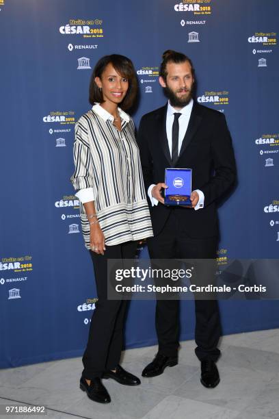 Actress Sonia Rolland and Chris Overton attend the 'Les Nuits En Or 2018' dinner gala at UNESCO on June 11, 2018 in Paris, France.
