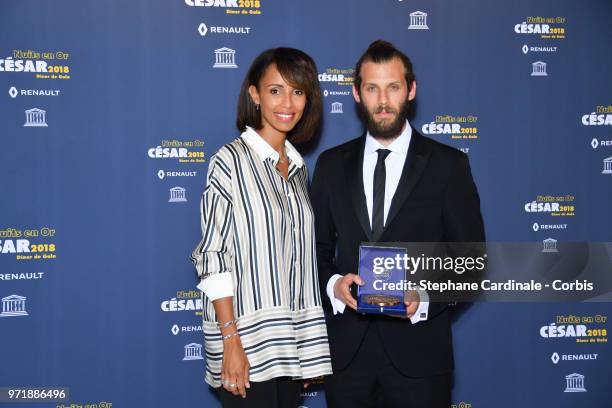 Actress Sonia Rolland and Chris Overton attend the 'Les Nuits En Or 2018' dinner gala at UNESCO on June 11, 2018 in Paris, France.