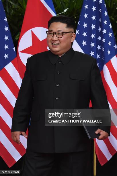 North Korea's leader Kim Jong Un after taking part in a signing ceremony with US President Donald Trump at the end of their historic US-North Korea...