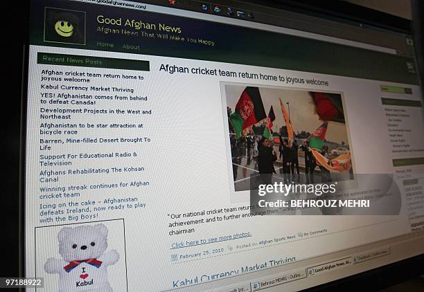 Afghanistan-unrest-media,FEATURE by Sardar Ahmad This picture taken on February 28, 2010 in Kabul shows the homepage and the logo of the "Good Afghan...