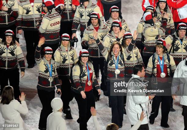 The silver medal-winning Canadian women's curling team walk with the Canadian Team during the Closing Ceremony of the Vancouver 2010 Winter Olympics...