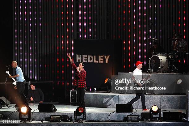 Tommy Mac, Jacob Hoggard, Dave Rosin and Chris Crippin of Hedley perform during the Closing Ceremony of the Vancouver 2010 Winter Olympics at BC...