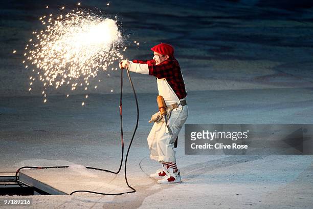 Mime Yves Dagenais performs before the Olympic cauldron is lit during the Closing Ceremony of the Vancouver 2010 Winter Olympics at BC Place on...