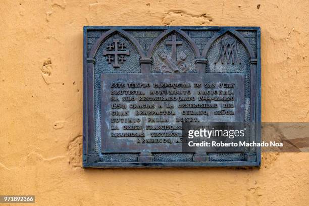 Historic plaque at the St. John the Baptist Catholic church. The church is among the oldest ones in the Caribbean island.