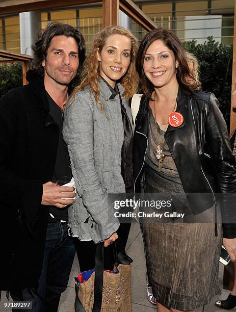 Greg Lauren, actress Elizabeth Berkley, and Lori Silverbush attend the FEED Foundation/Hungry In America project benefit hosted by Vanity Fair held...