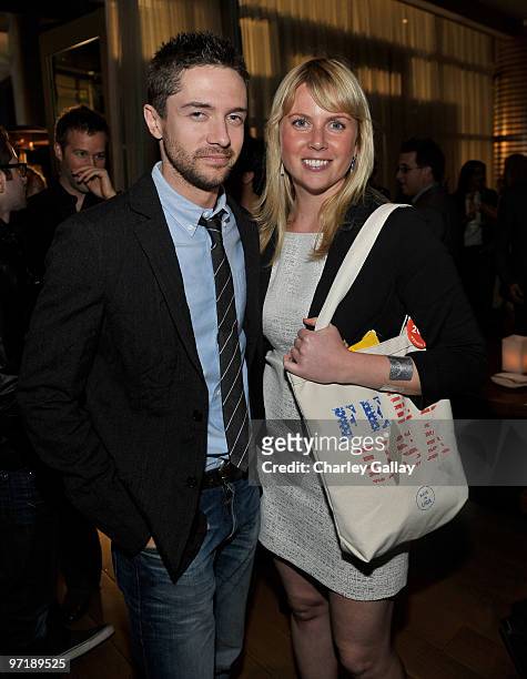 Actor Topher Grace and Ellen Gustafson attend the FEED Foundation/Hungry In America project benefit hosted by Vanity Fair held at Craft Los Angeles...