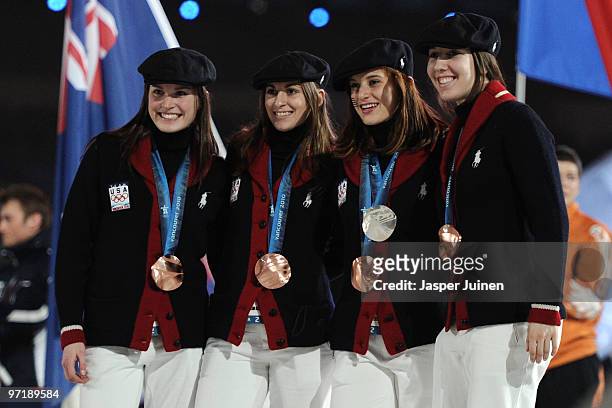 Bronze medal winners team USA in the 3000 m relay short track attend the Closing Ceremony of the Vancouver 2010 Winter Olympics at BC Place on...