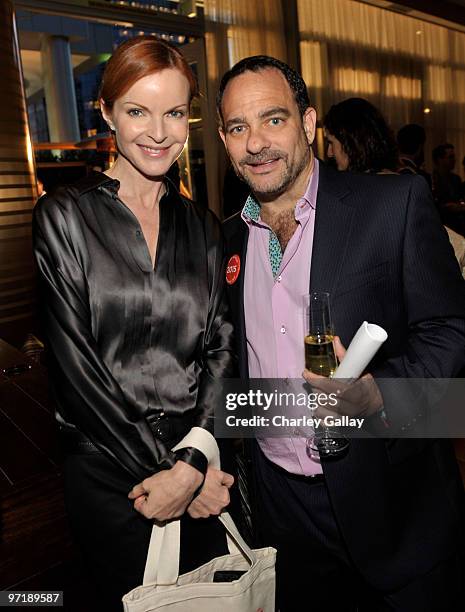 Actress Marcia Cross and Feeding America's Joel Goldman attend the FEED Foundation/Hungry In America project benefit hosted by Vanity Fair held at...