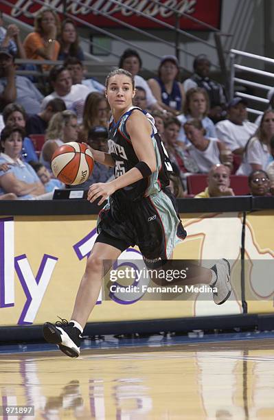 Becky Hammon of the New York Liberty drives upcourt during the game againsst the Orlando Miracle on June 23, 2002 at TD Waterhouse Centre in Orlando,...