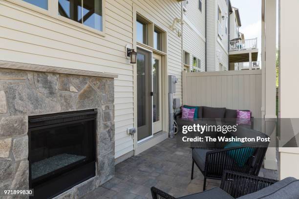 Rear Patio sharing a Fireplace with the Basement Rec Room in the Arlington model home at Mateny Hill on June 1, 2018 in Germntown Maryland.