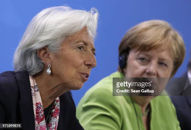 German Chancellor Angela Merkel and International Monetary Fund head Christine Lagarde speak at a press conference following talks at the Chancellery...