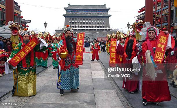 People perform at Qianmen Street to celebrate the Lantern Festival on February 28, 2010 in Beijing, China. Lantern Festival marks the end of the...