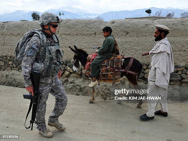 Afghanistan-unrest-US-civilian-aid, FOCUS by Ben Sheppard In this February 22, 2010 photograph, a former New York police detective, who declined to...