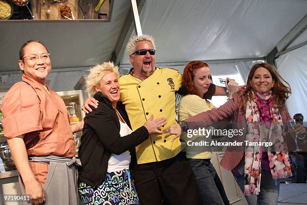 Masaharu Morimoto, Anne Burrell, Guy Fieri and Ingrid Hoffmann attend the 2010 South Beach Wine and Food Festival Grand Tasting Village on February...