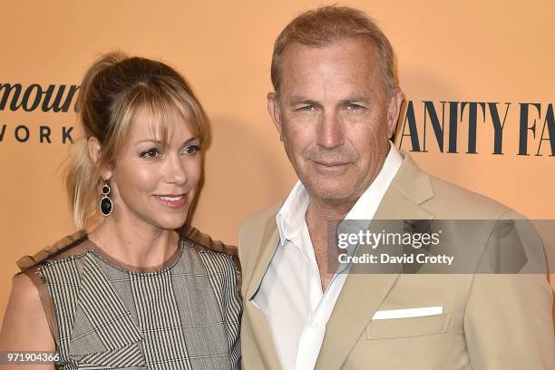 Christine Baumgartner and Kevin Costner attend the "Yellowstone" World Premiere at Paramount Studios on June 11, 2018 in Los Angeles, California.