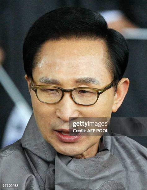 South Korean President Lee Myung-Bak talks with people after a remembrance ceremony marking the 91st anniversary of the March First Independence...