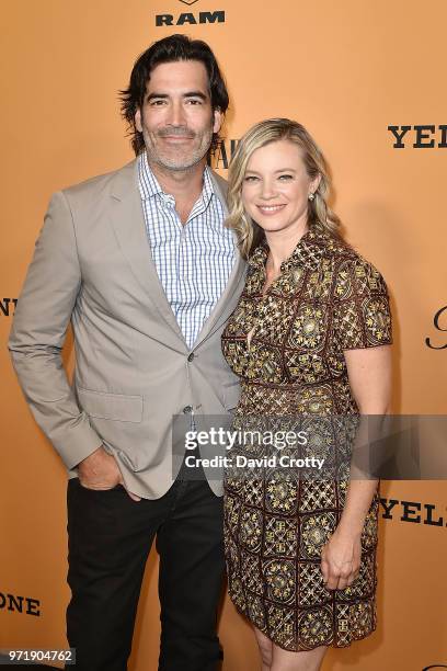 Carter Oosterhouse and Amy Smart attend the "Yellowstone" World Premiere at Paramount Studios on June 11, 2018 in Los Angeles, California.