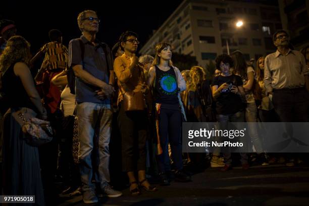 People take part in a protest against Italian Minister Matteo Salvini in Palermo, Italy, on June 12, 2018. The leader of the Lega Matteo Salvini, now...