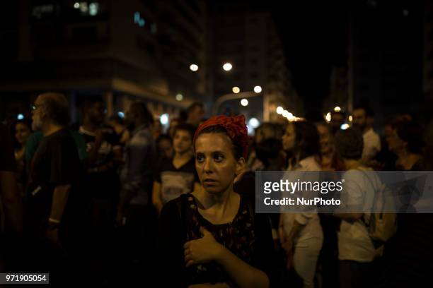 People take part in a protest against Italian Minister Matteo Salvini in Palermo, Italy, on June 12, 2018. The leader of the Lega Matteo Salvini, now...