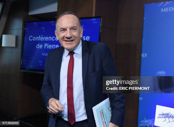 French employers' asssociation Medef head Pierre Gattaz holds his last monthly press conference at the association headquarters on June 12, 2018...