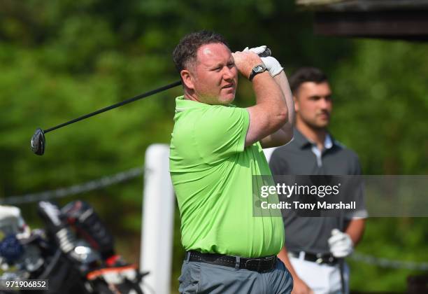 Tom Gillespie of Kendleshire Golf Club plays his first shot on the 1st tee during The Lombard Trophy South Qualifier at Camberley Heath Golf Club on...