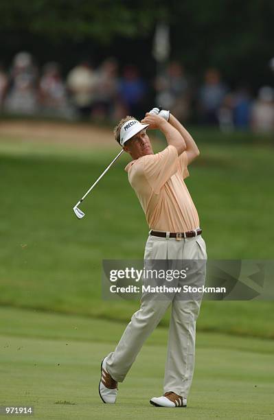 Stuart Appleby of Australia hits out on the third fairway during the third round of the Advil Western Open July 6, 2002 at Cog Hill Golf and Country...