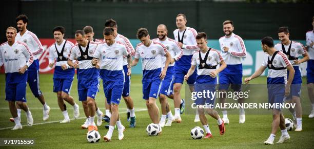 Players of the Russian national football team attend a training session in Novogorsk outside Moscow on June 12 ahead of the Russia 2018 World Cup...