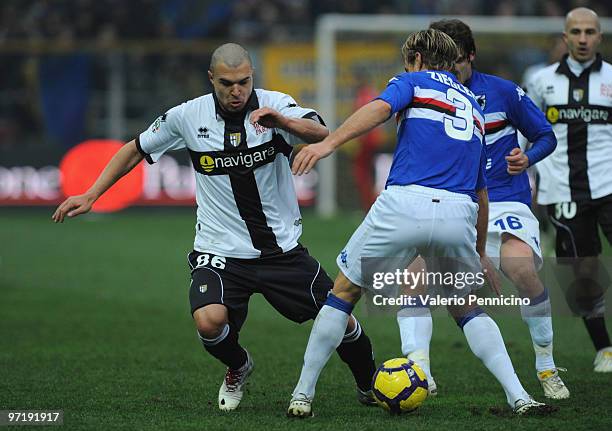 Emilov Valeri Bojinov of Parma FC is challenged by Reto Ziegler and Andrea Poli of UC Sampdoria during the Serie A match between Parma FC and UC...